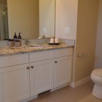 The after shot of a bathroom renovated by Lux Interiors.