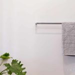 A photo of a bathroom towel rack.