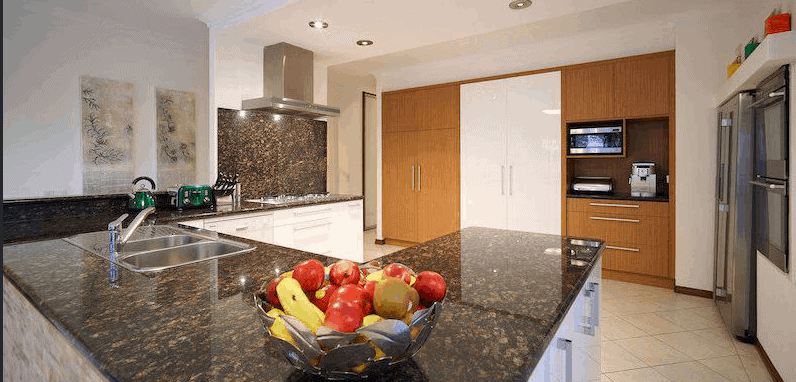 A photo of a kitchen area, before being renovated by Lux Interiors.