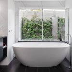 A photo of a large bath tub.