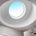 A photo of a curved skylight above a bathroom.