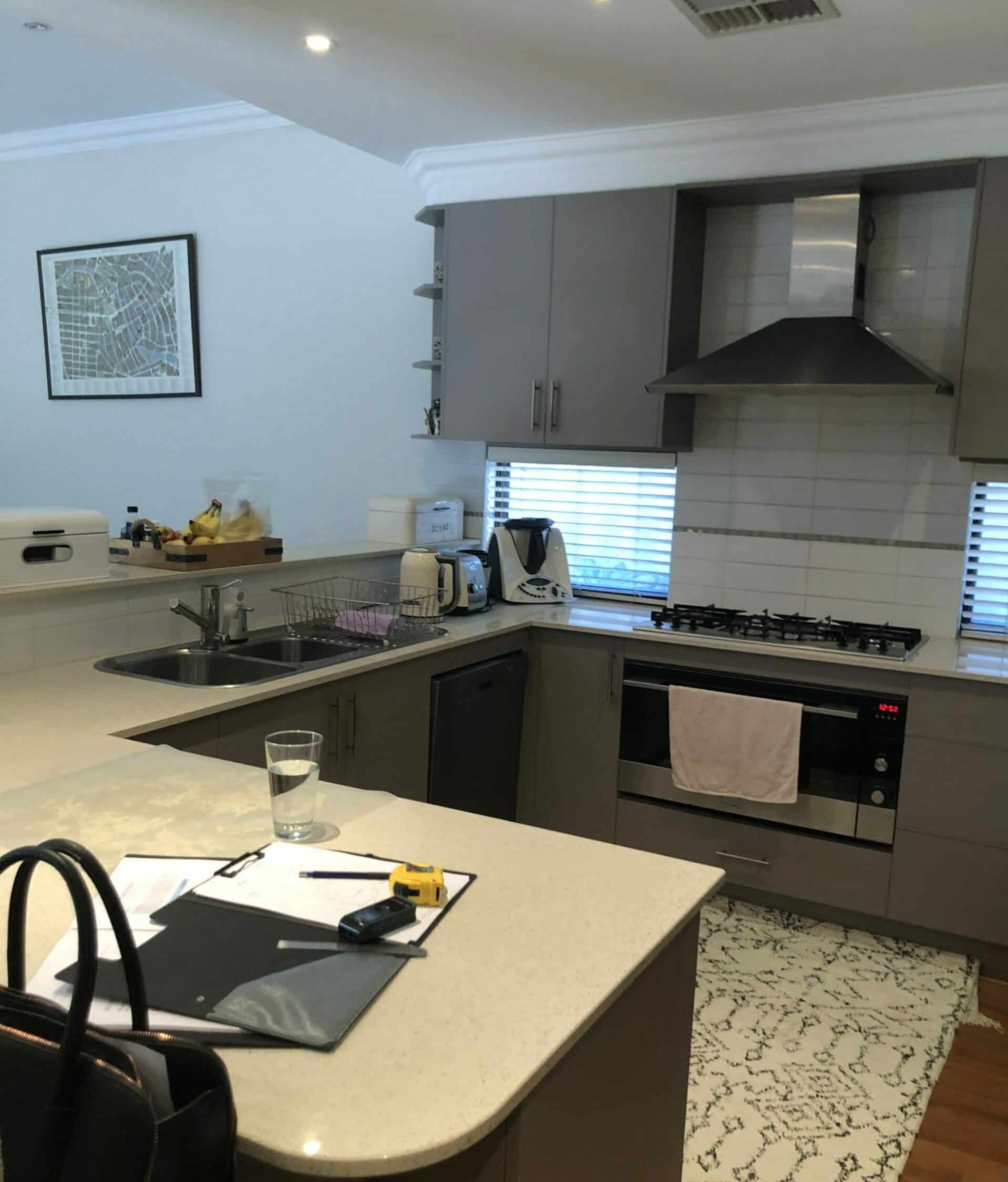 A photo of the kitchen area, before being renovated.