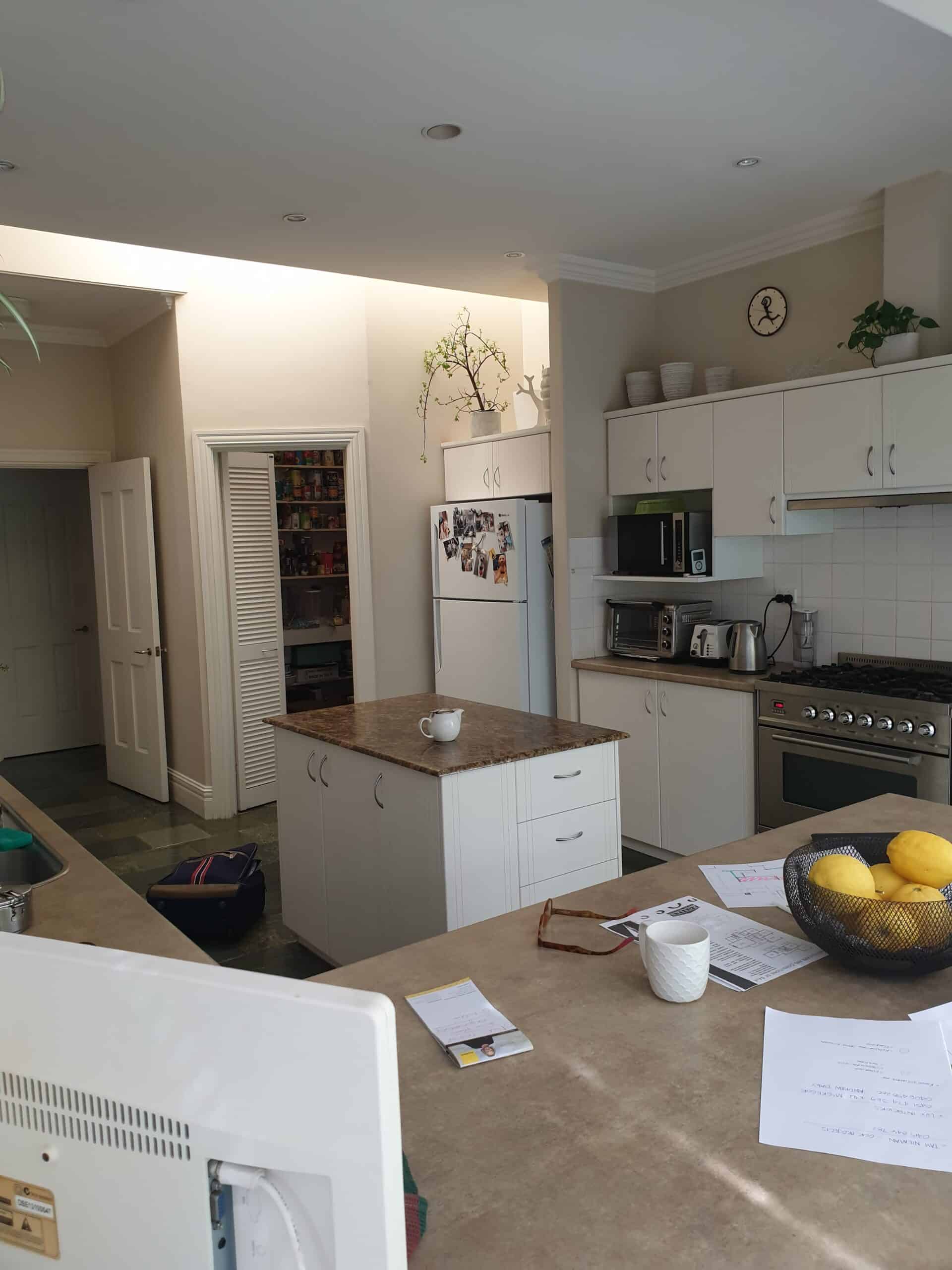 A photo of a kitchen area, before being renovated.