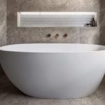 A photo of a large round bathtub.