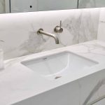 Marble bathroom sink with hand soap