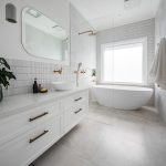 A photo of a luxury bathroom renovated by Lux Interiors.