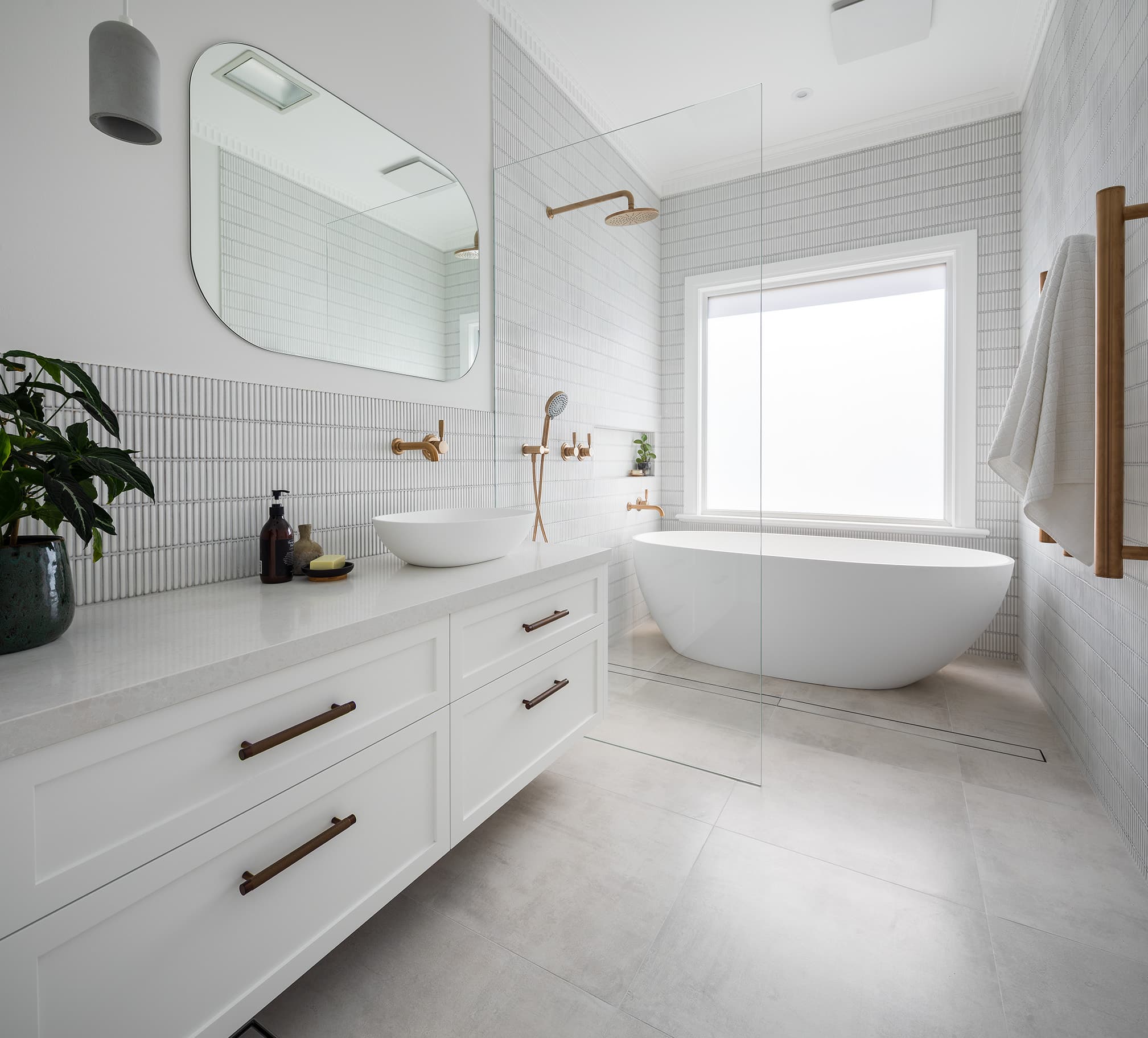 A photo of a luxury bathroom renovated by Lux Interiors.