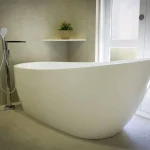 A photo of a large, white bathtub.