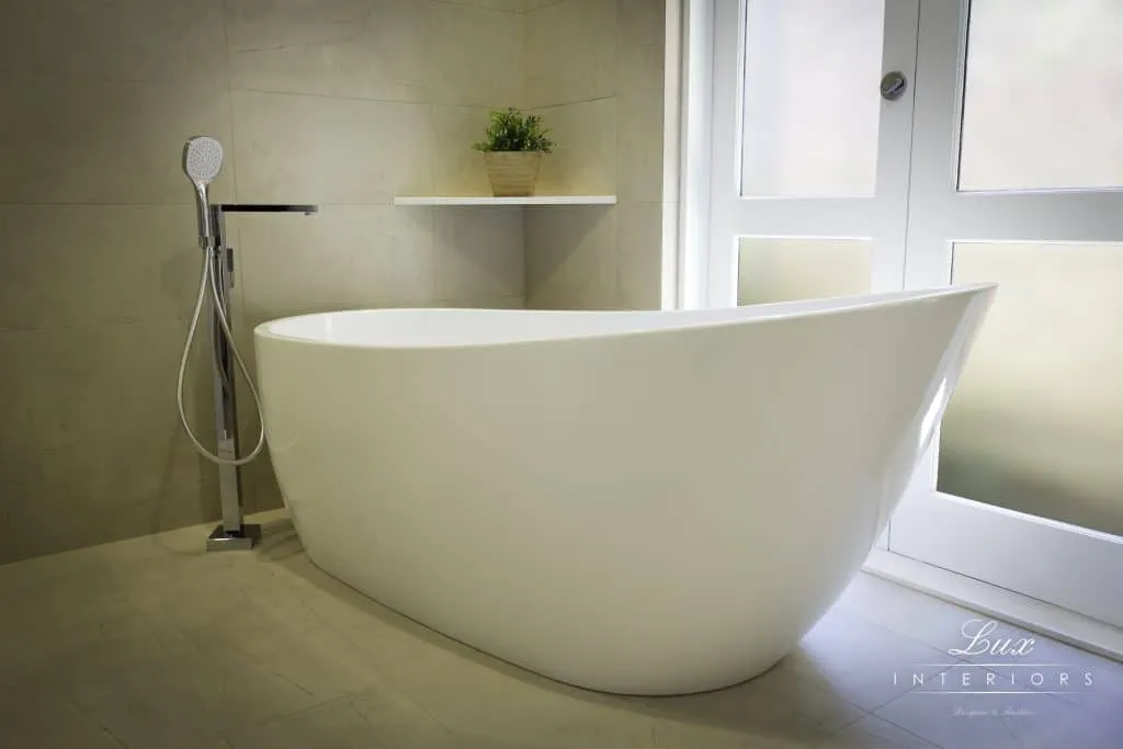 A photo of a large, white bathtub.