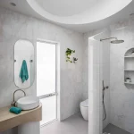 A photo of a curved skylight above a bathroom.